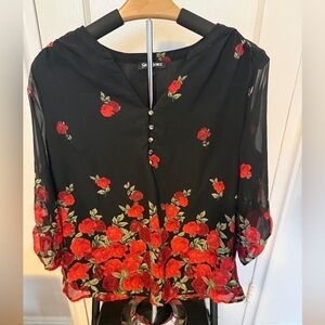 Sara Michelle Black Blouse with Red Floral Design